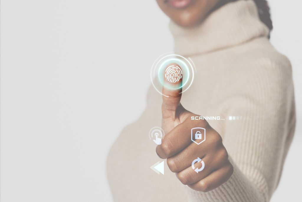 Woman scanning fingerprint with futuristic interface smart techn